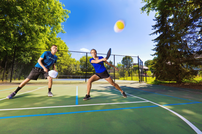 Pickleball player executing a successful third shot drop, demonstrating proper form and technique